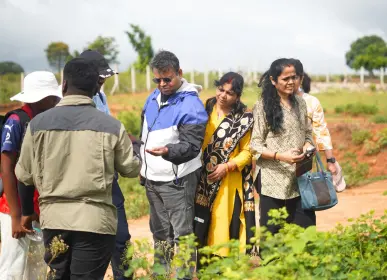 Home Families exploring the farmland during an nature walk visit