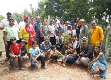 Home Participants during a regenerative farming practice session at farm