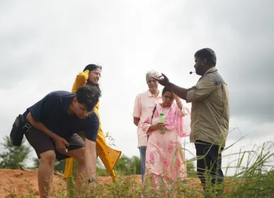 Home farm owners taking a hands-on farming session at Anugraha Farms