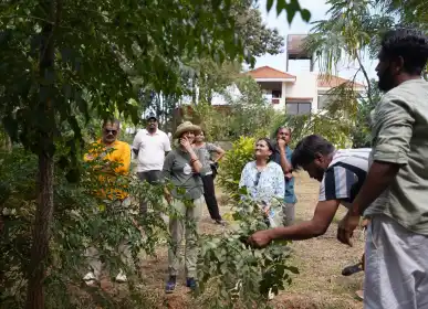 Home owners learning regenerative farming practices session at Anugraha Farms