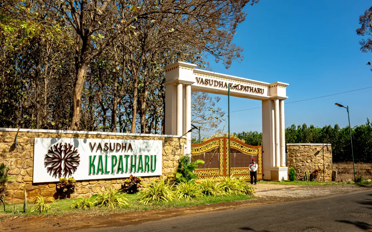 Entrance to Vasudha Kalpataru farmland plot near Bangalore